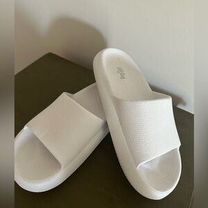 Corky’s white slides